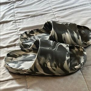 Black and White NIKE Marble Slides